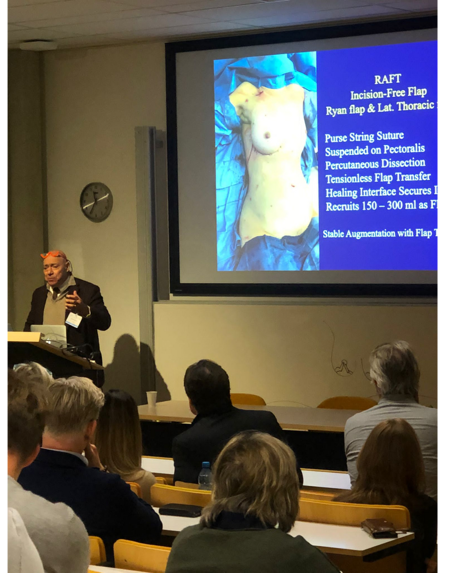 Dr. Roger Khouri speaking at a professional lecture