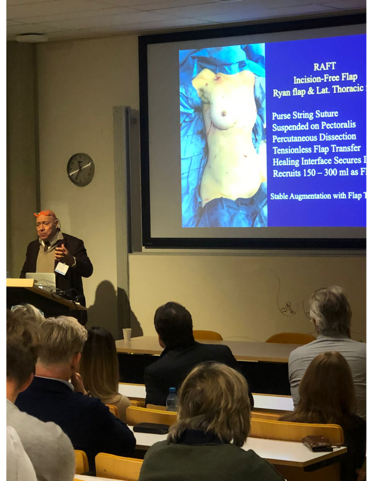 Dr. Roger Khouri speaking at a lecture