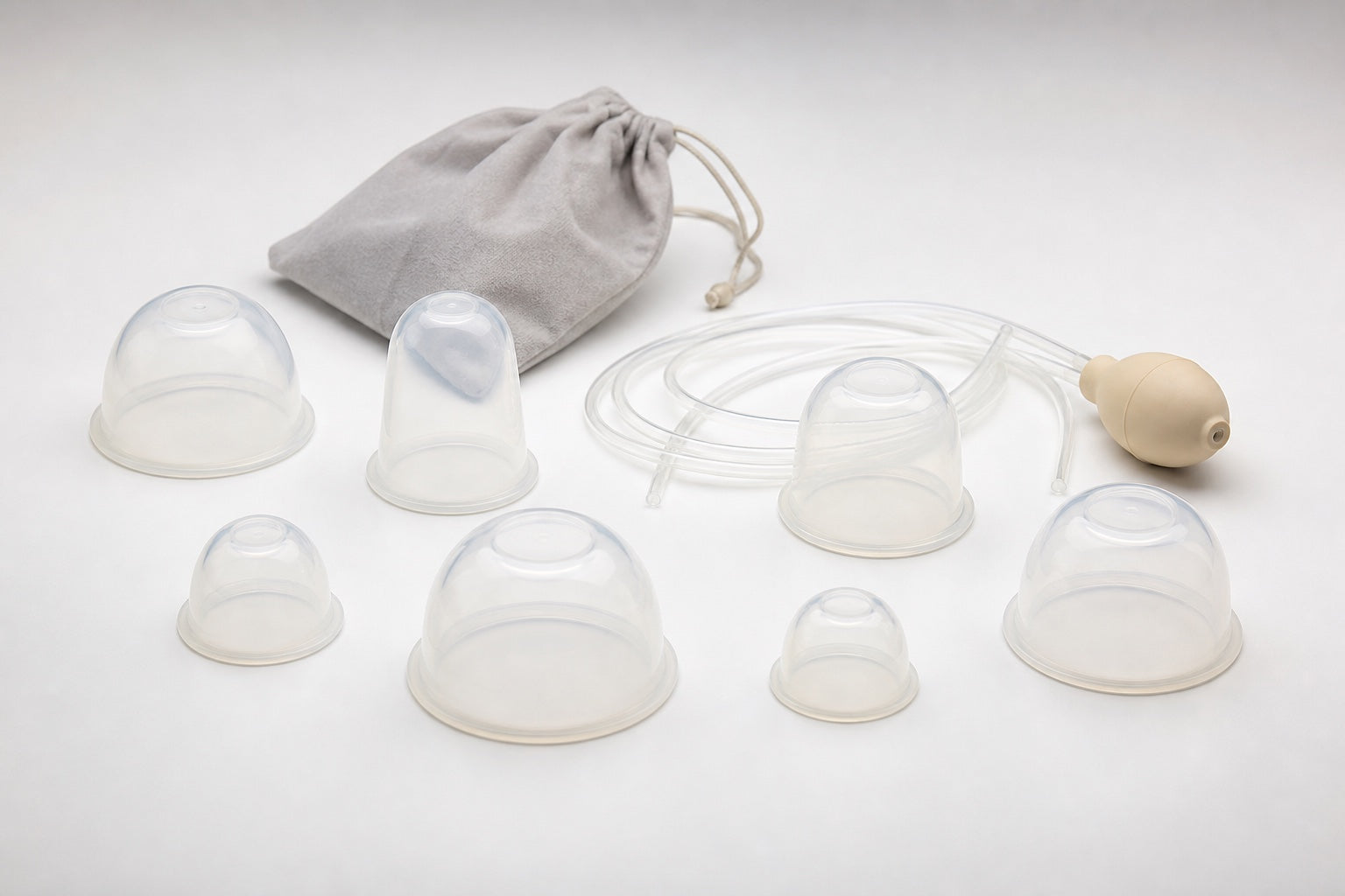 Typical intermittent breast pump components shown for comparison